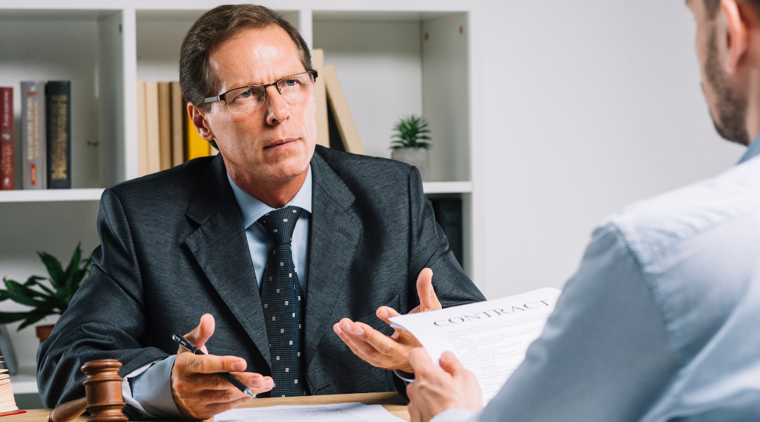man talking to an attorney during a lawyer consutation